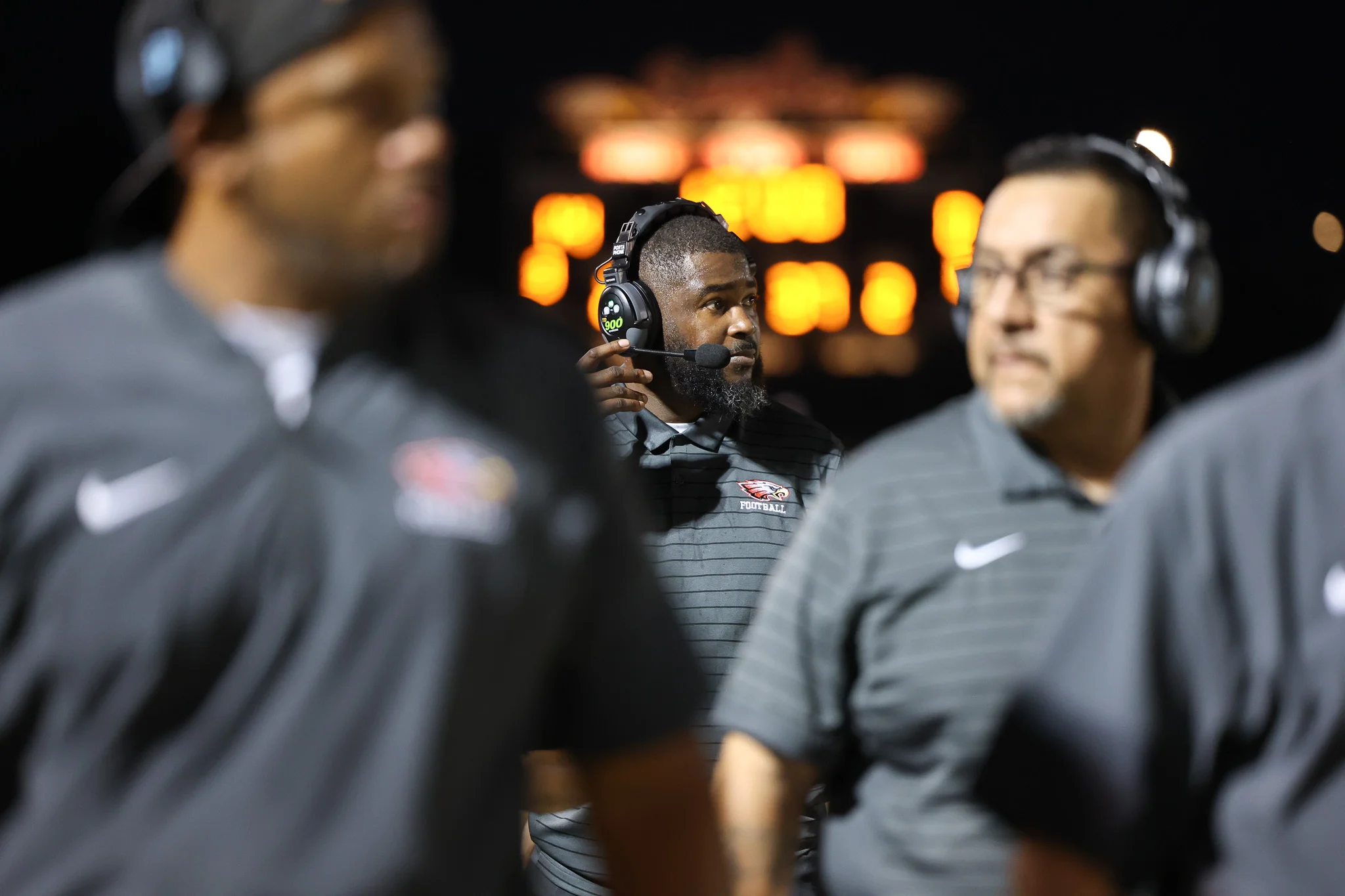 Coach looking on at the Ironwood-Apollo Game